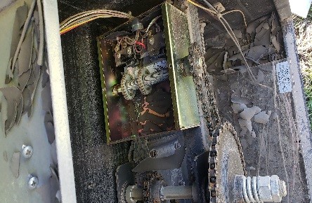 Caked mud all over the gate operator motor