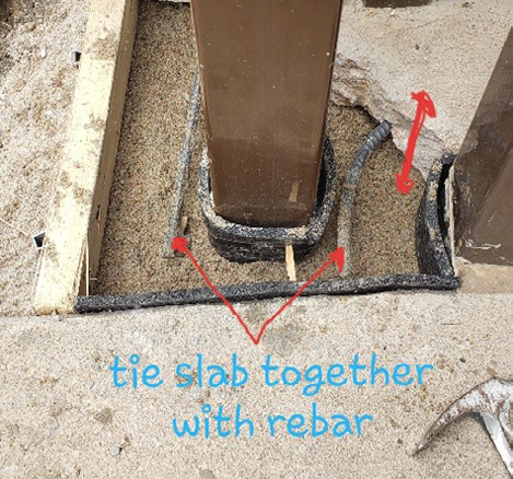Photo eye post with indications to tie slab together with rebar for the footing