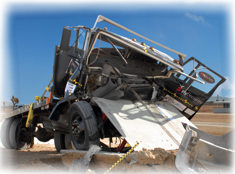 A large industrial truck that has driven into a crash rated sytem