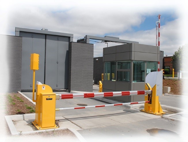 Crash rated barrier arms in front of an industrial facility