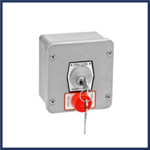 Gate keyed switch with stop button. Tamper-proof. Mortise cylinder. Emergency stop button.